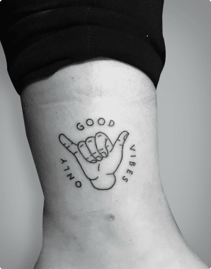 outline hand letters tattoo