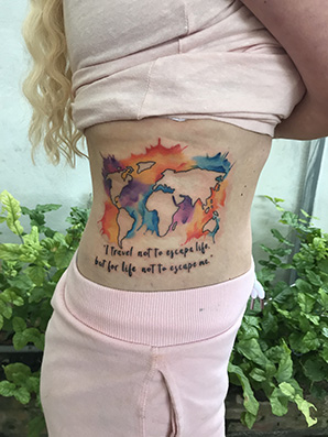 colored wold map tattoo