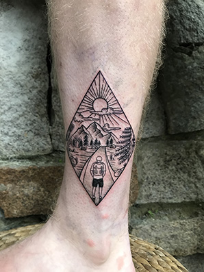landscape blackwork tattoo on ankle