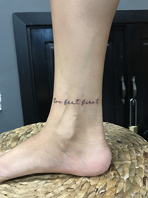 letters band tattoo on ankle