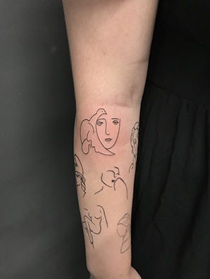 Line work tattoo on forearm
