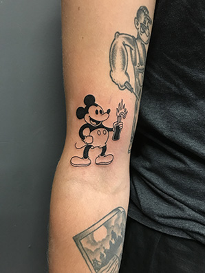 blackwork mickey mouse tattoo