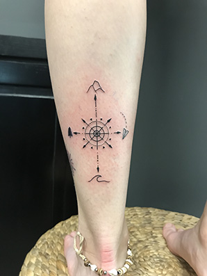 vector compass tattoo on calf