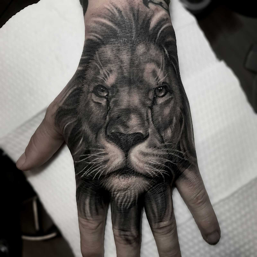 half sleeve lion tattoo - Design of TattoosDesign of Tattoos