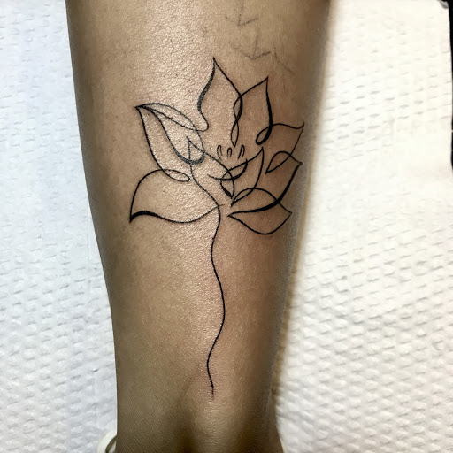 Beautiful mini lotus flower tattoo that you don’t want to miss