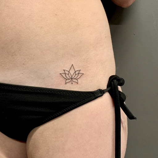 Beautiful mini lotus flower tattoo that you don’t want to miss