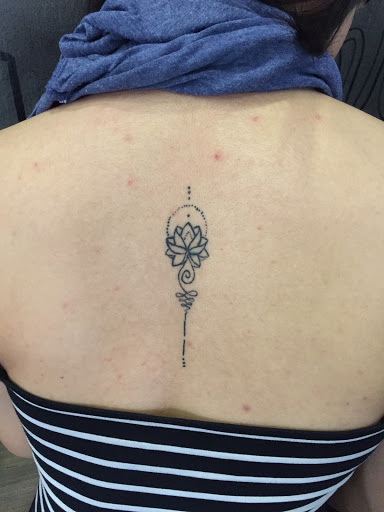 Beautiful mini lotus flower tattoo that you don’t want to miss