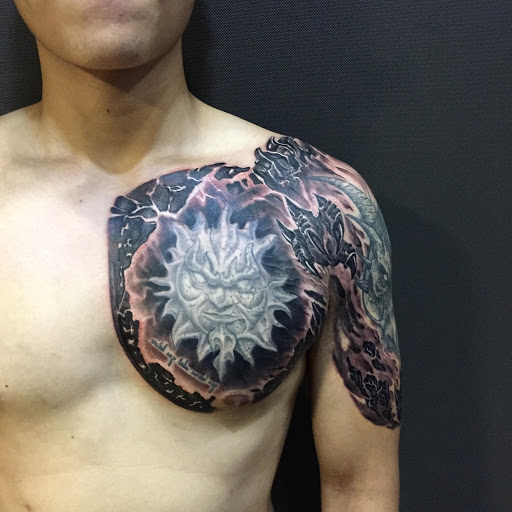 tattoos for men on chest lettering