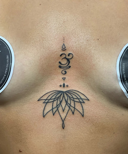 Lotus tattoo with om symbol meaning and design - 1984 Studio