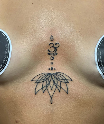 ohm lotus tattoo meaning