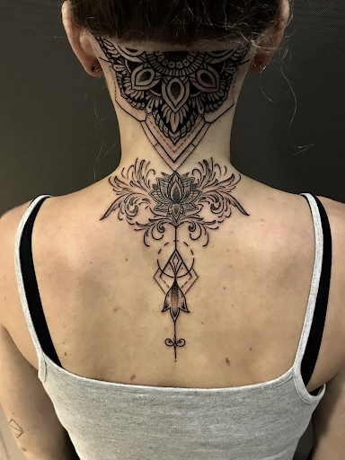 Twisting it: geometric lotus tattoo versus watercolor lotus tattoo