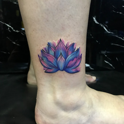 Dark Purple Lotus Tattoo On Thigh