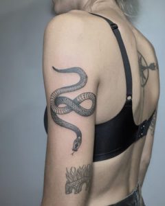 Marvelous snake tattoo - Origin, meaning, and ideas