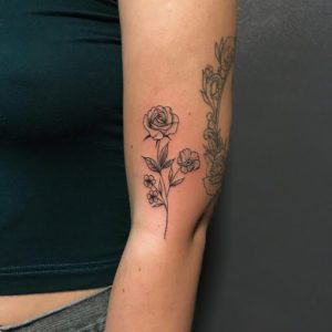 forearm rose tattoo for guys