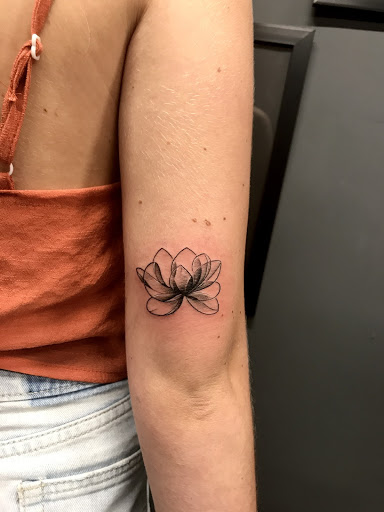 graceful lotus symbol tattoo for girls