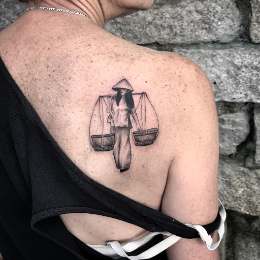 stone lettering tattoo