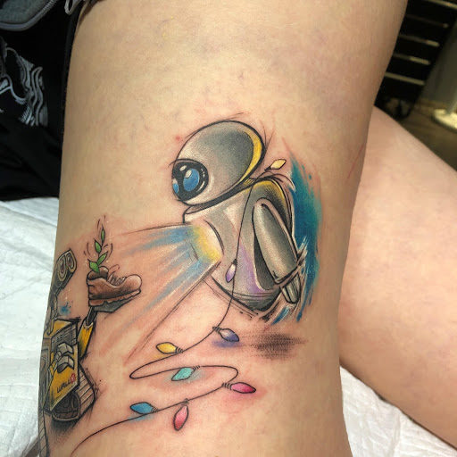 Matching ankle tattoos of WALLE and EVA by Murat