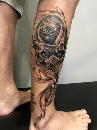 Tattoos and their meanings: Roses and Skulls - Iron Brush Tattoo