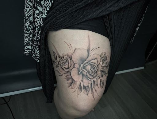 Beautiful rose tattoo: style and design