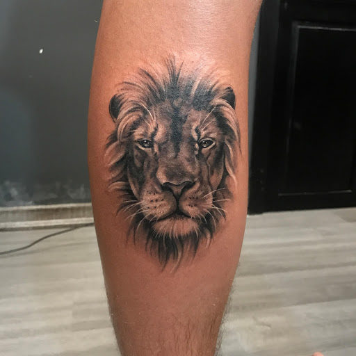 lion tattoo #caduceustattoo #calftattoo #blacktattoo #tattooedmen  #since2012❤️ #best-tattoos #skinarttattoo #best_portrait_tattoo_ar... |  Instagram