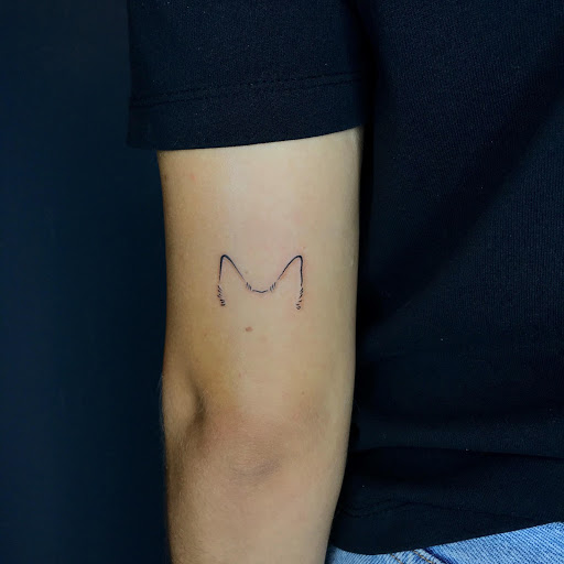 Minimalist cat ears tattoo  Cat tattoo Minimalist tattoo Trendy tattoos